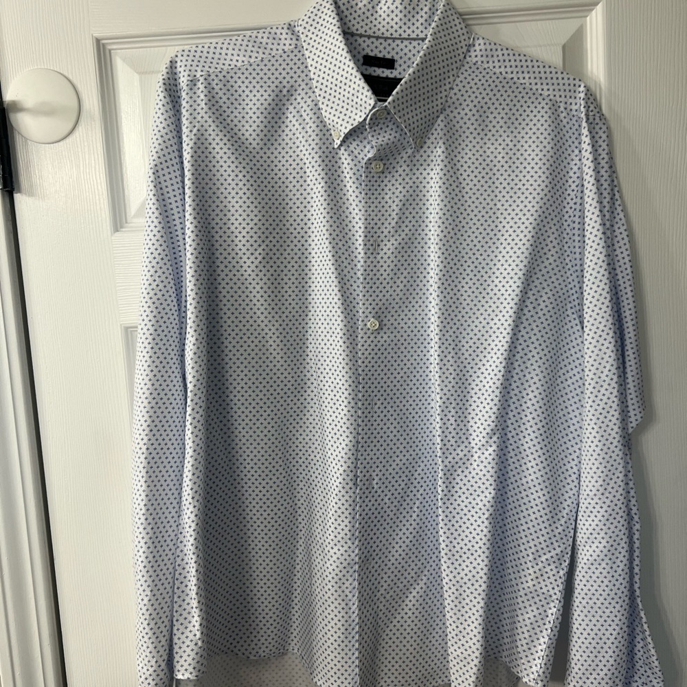 White long sleeve shirt with blue check.